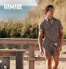 Man wearing a swim set with matching shirt and volley swim shorts, from Hamabe. 