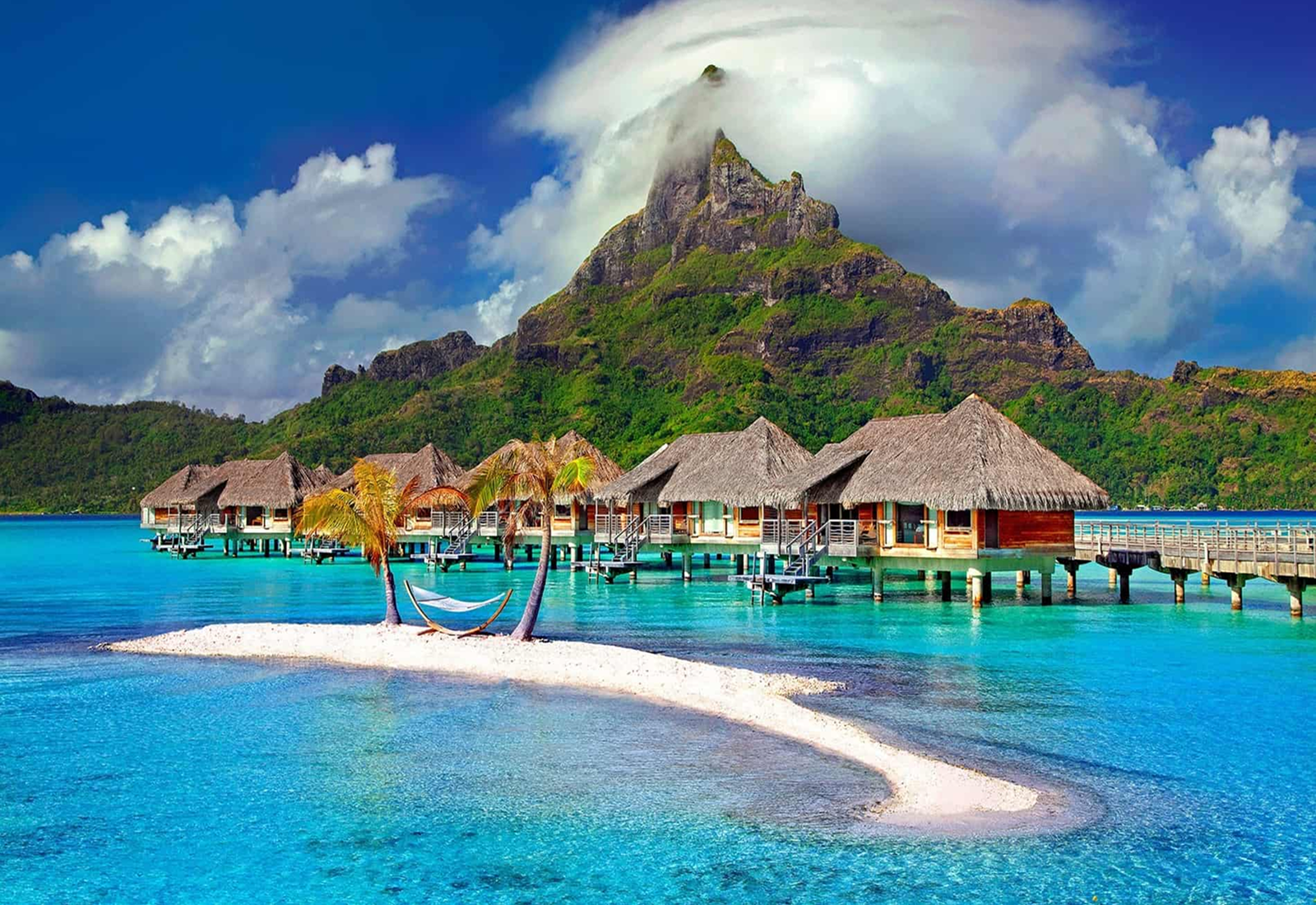 Bora Bora beach and its stilt houses, French Polynesia. Photo by Julius Silver on Pixnio.